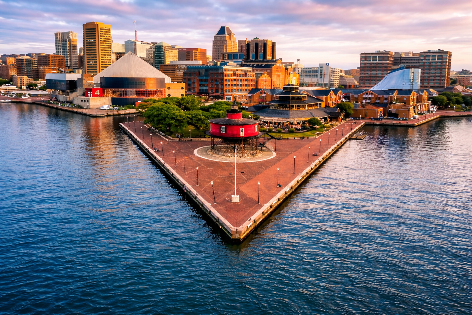 Seven Foot Knoll Lighthouse at Baltimore Inner Harbor with harbor water and skyline in Maryland